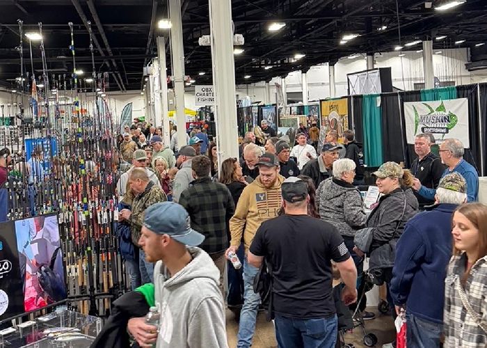 Packed aisles at a hunting and fishing expo